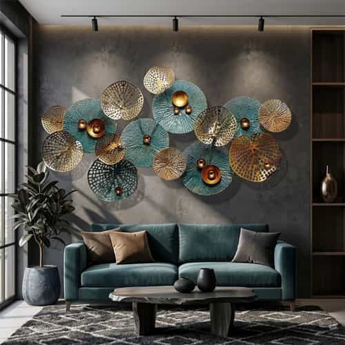 Modern living room featuring large metal wall decor with 3D stacked teal and gold lotus leaves over a teal velvet sofa and concrete coffee table.