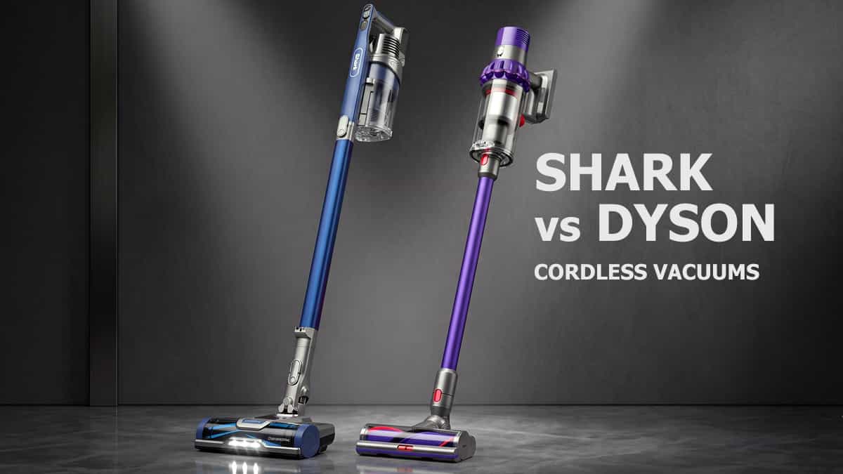 Side-by-side comparison of Shark IZ363HT and Dyson V10 cordless stick vacuums against a dark grey studio background with "SHARK vs DYSON CORDLESS VACUUMS" text.